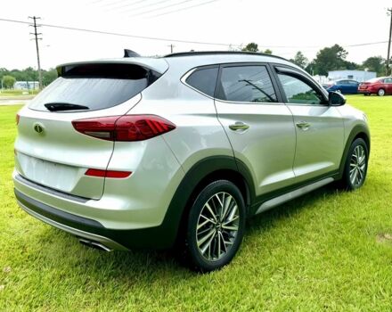 Серый Хендай Туксон, объемом двигателя 2.4 л и пробегом 39 тыс. км за 9500 $, фото 6 на Automoto.ua