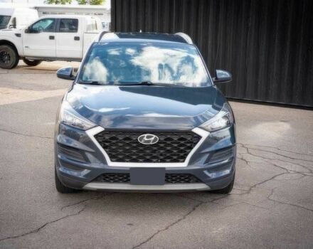 Серый Хендай Туксон, объемом двигателя 2.4 л и пробегом 33 тыс. км за 14000 $, фото 1 на Automoto.ua