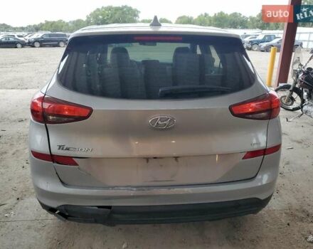 Серый Хендай Туксон, объемом двигателя 2 л и пробегом 104 тыс. км за 5600 $, фото 5 на Automoto.ua