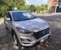 Серый Хендай Туксон, объемом двигателя 2 л и пробегом 167 тыс. км за 22700 $, фото 1 на Automoto.ua