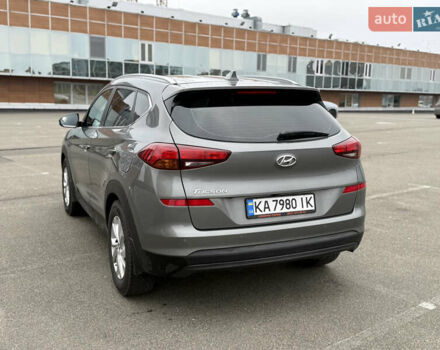 Серый Хендай Туксон, объемом двигателя 2 л и пробегом 167 тыс. км за 19400 $, фото 6 на Automoto.ua