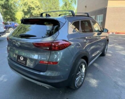 Серый Хендай Туксон, объемом двигателя 2.4 л и пробегом 23 тыс. км за 5400 $, фото 6 на Automoto.ua