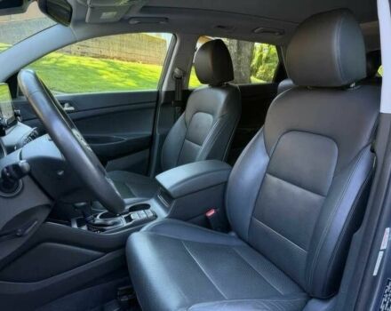 Серый Хендай Туксон, объемом двигателя 2.4 л и пробегом 23 тыс. км за 5400 $, фото 9 на Automoto.ua