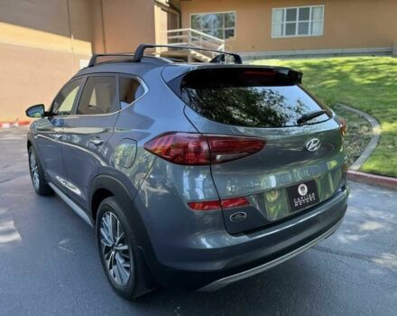 Серый Хендай Туксон, объемом двигателя 2.4 л и пробегом 23 тыс. км за 5400 $, фото 4 на Automoto.ua
