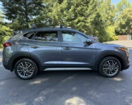 Серый Хендай Туксон, объемом двигателя 2.4 л и пробегом 23 тыс. км за 5400 $, фото 7 на Automoto.ua