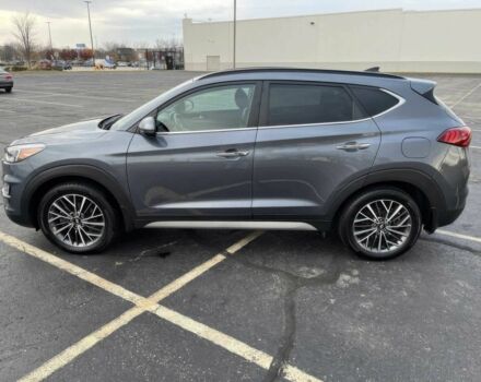 Серый Хендай Туксон, объемом двигателя 2.4 л и пробегом 12 тыс. км за 9000 $, фото 2 на Automoto.ua