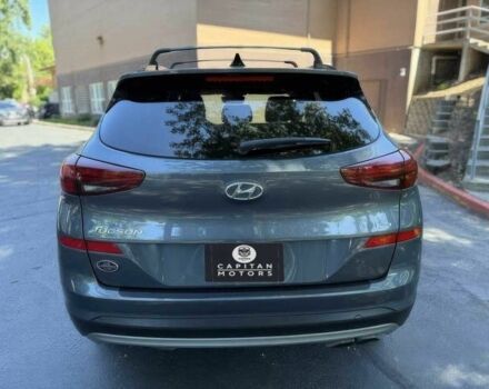 Серый Хендай Туксон, объемом двигателя 2.4 л и пробегом 23 тыс. км за 5400 $, фото 5 на Automoto.ua