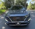 Серый Хендай Туксон, объемом двигателя 2.4 л и пробегом 23 тыс. км за 5400 $, фото 1 на Automoto.ua
