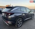 Серый Хендай Туксон, объемом двигателя 1.6 л и пробегом 51 тыс. км за 35000 $, фото 2 на Automoto.ua