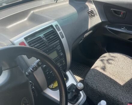 Серый Хендай Туксон, объемом двигателя 2 л и пробегом 250 тыс. км за 5800 $, фото 7 на Automoto.ua