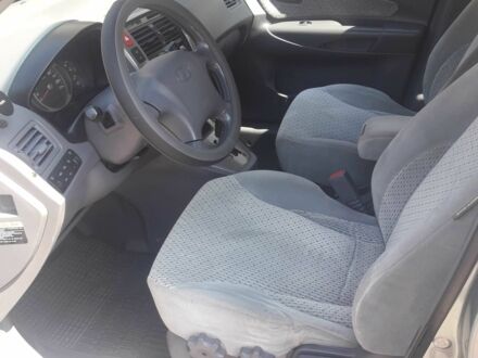 Серый Хендай Туксон, объемом двигателя 2 л и пробегом 235 тыс. км за 4600 $, фото 1 на Automoto.ua