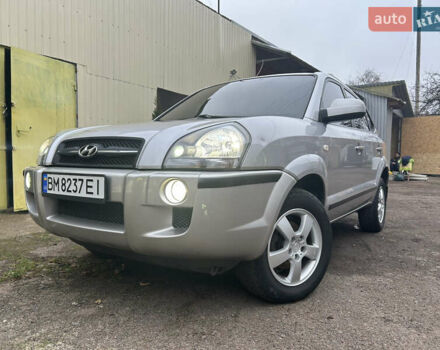 Серый Хендай Туксон, объемом двигателя 1.98 л и пробегом 270 тыс. км за 7000 $, фото 1 на Automoto.ua
