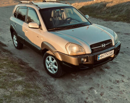 Серый Хендай Туксон, объемом двигателя 1.99 л и пробегом 269 тыс. км за 6999 $, фото 1 на Automoto.ua