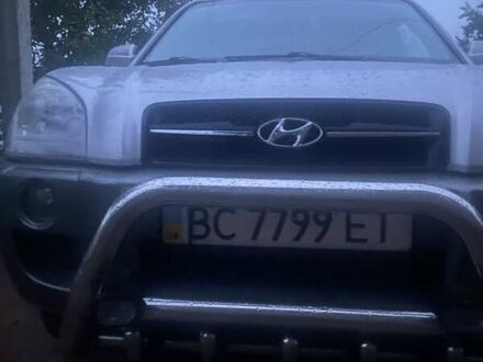 Сірий Хендай Туксон, об'ємом двигуна 1.99 л та пробігом 251 тис. км за 7000 $, фото 1 на Automoto.ua