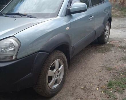 Сірий Хендай Туксон, об'ємом двигуна 1.98 л та пробігом 350 тис. км за 6400 $, фото 1 на Automoto.ua