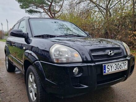 Серый Хендай Туксон, объемом двигателя 2 л и пробегом 240 тыс. км за 4200 $, фото 1 на Automoto.ua