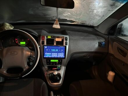 Серый Хендай Туксон, объемом двигателя 2 л и пробегом 292 тыс. км за 5300 $, фото 1 на Automoto.ua