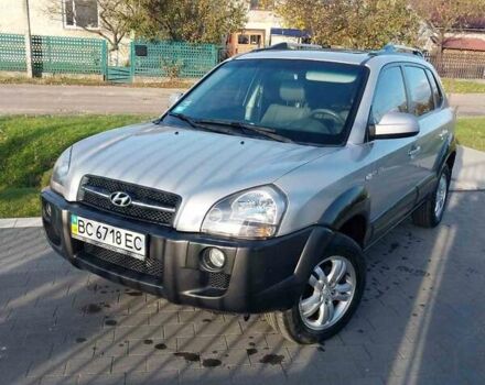 Серый Хендай Туксон, объемом двигателя 1.98 л и пробегом 215 тыс. км за 6300 $, фото 1 на Automoto.ua