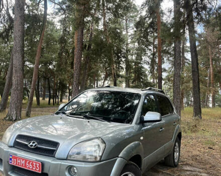 Серый Хендай Туксон, объемом двигателя 2 л и пробегом 227 тыс. км за 7999 $, фото 1 на Automoto.ua