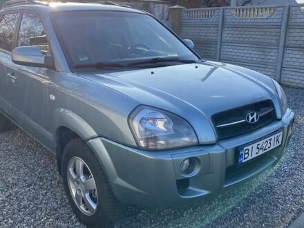 Серый Хендай Туксон, объемом двигателя 1.98 л и пробегом 220 тыс. км за 8500 $, фото 1 на Automoto.ua