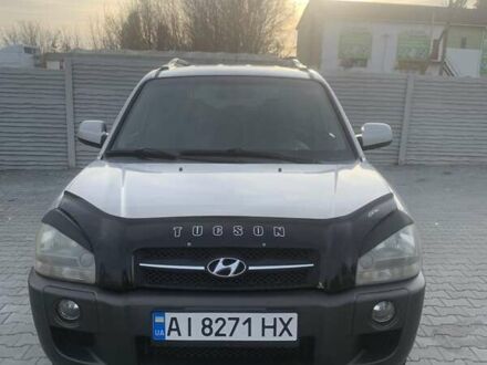 Серый Хендай Туксон, объемом двигателя 1.98 л и пробегом 215 тыс. км за 7500 $, фото 1 на Automoto.ua