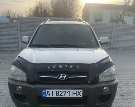 Серый Хендай Туксон, объемом двигателя 1.98 л и пробегом 215 тыс. км за 7500 $, фото 1 на Automoto.ua