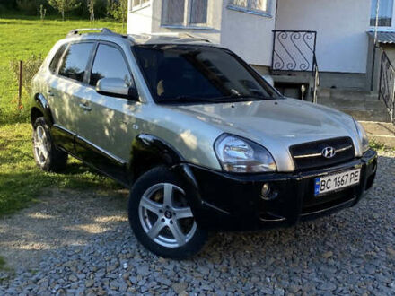 Серый Хендай Туксон, объемом двигателя 1.99 л и пробегом 238 тыс. км за 7700 $, фото 1 на Automoto.ua