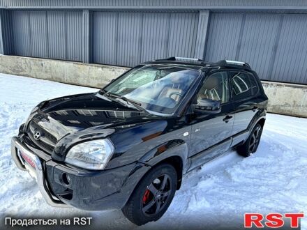 Серый Хендай Туксон, объемом двигателя 2 л и пробегом 234 тыс. км за 8900 $, фото 1 на Automoto.ua