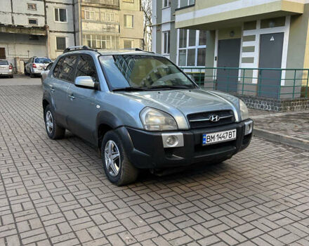 Серый Хендай Туксон, объемом двигателя 1.98 л и пробегом 269 тыс. км за 7500 $, фото 1 на Automoto.ua