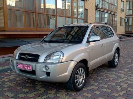Серый Хендай Туксон, объемом двигателя 2 л и пробегом 124 тыс. км за 9300 $, фото 1 на Automoto.ua