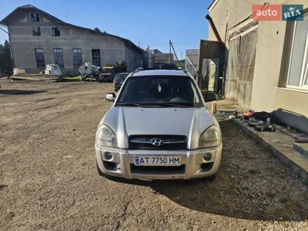 Серый Хендай Туксон, объемом двигателя 2 л и пробегом 320 тыс. км за 6900 $, фото 1 на Automoto.ua