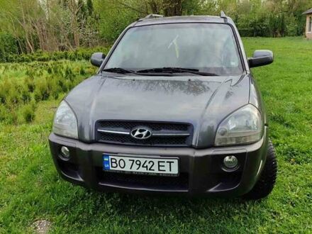 Серый Хендай Туксон, объемом двигателя 1.99 л и пробегом 184 тыс. км за 8300 $, фото 1 на Automoto.ua