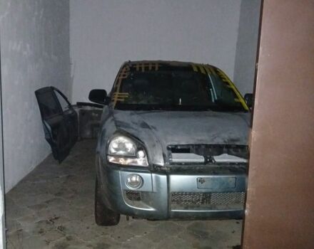 Серый Хендай Туксон, объемом двигателя 2 л и пробегом 230 тыс. км за 4500 $, фото 1 на Automoto.ua