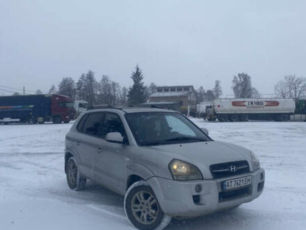 Серый Хендай Туксон, объемом двигателя 1.99 л и пробегом 260 тыс. км за 6999 $, фото 1 на Automoto.ua