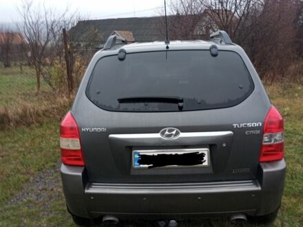 Сірий Хендай Туксон, об'ємом двигуна 2 л та пробігом 260 тис. км за 7999 $, фото 1 на Automoto.ua