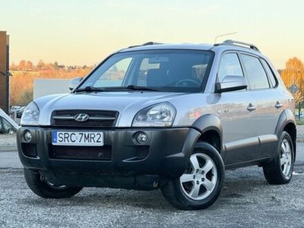 Серый Хендай Туксон, объемом двигателя 2 л и пробегом 262 тыс. км за 3750 $, фото 1 на Automoto.ua