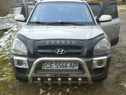 Серый Хендай Туксон, объемом двигателя 1.98 л и пробегом 169 тыс. км за 10500 $, фото 1 на Automoto.ua