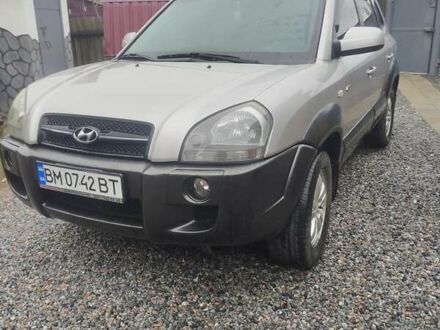 Серый Хендай Туксон, объемом двигателя 1.98 л и пробегом 153 тыс. км за 8200 $, фото 1 на Automoto.ua