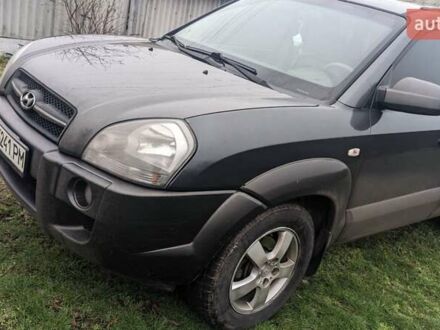 Серый Хендай Туксон, объемом двигателя 1.99 л и пробегом 270 тыс. км за 7900 $, фото 1 на Automoto.ua