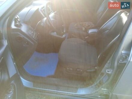 Серый Хендай Туксон, объемом двигателя 1.98 л и пробегом 320 тыс. км за 7300 $, фото 1 на Automoto.ua