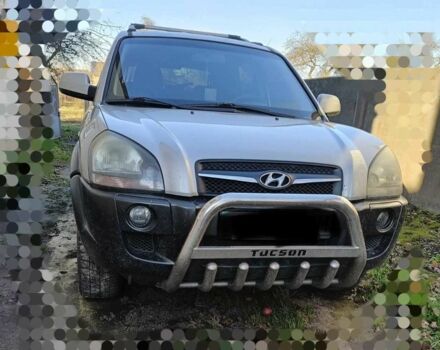 Серый Хендай Туксон, объемом двигателя 2 л и пробегом 220 тыс. км за 8000 $, фото 1 на Automoto.ua