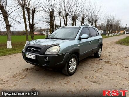 Серый Хендай Туксон, объемом двигателя 2.7 л и пробегом 228 тыс. км за 7650 $, фото 1 на Automoto.ua
