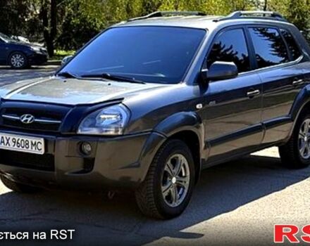 Серый Хендай Туксон, объемом двигателя 2 л и пробегом 170 тыс. км за 8000 $, фото 1 на Automoto.ua