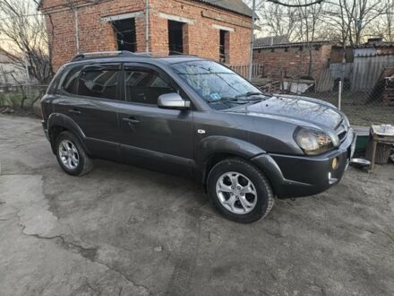 Серый Хендай Туксон, объемом двигателя 2 л и пробегом 197 тыс. км за 8700 $, фото 1 на Automoto.ua