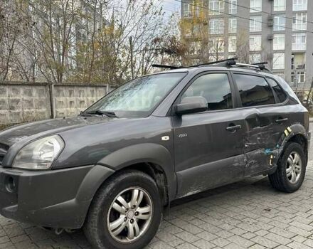 Серый Хендай Туксон, объемом двигателя 1.99 л и пробегом 221 тыс. км за 6000 $, фото 1 на Automoto.ua