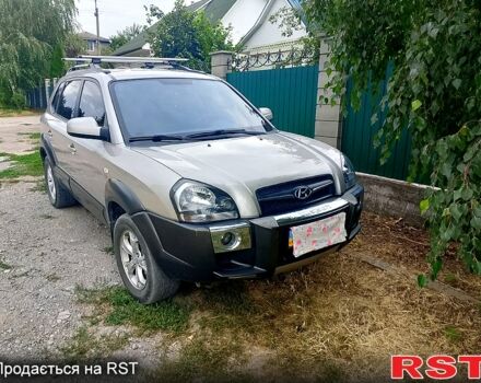 Серый Хендай Туксон, объемом двигателя 2 л и пробегом 135 тыс. км за 9700 $, фото 1 на Automoto.ua