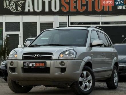 Серый Хендай Туксон, объемом двигателя 1.98 л и пробегом 140 тыс. км за 9300 $, фото 1 на Automoto.ua