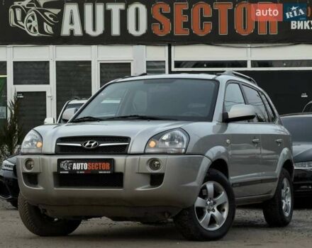 Серый Хендай Туксон, объемом двигателя 1.98 л и пробегом 140 тыс. км за 9300 $, фото 1 на Automoto.ua