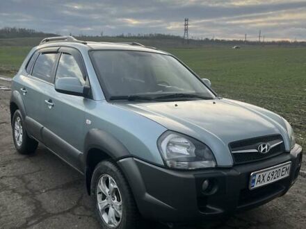 Сірий Хендай Туксон, об'ємом двигуна 1.98 л та пробігом 197 тис. км за 9800 $, фото 1 на Automoto.ua