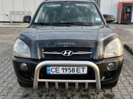 Серый Хендай Туксон, объемом двигателя 1.98 л и пробегом 216 тыс. км за 7700 $, фото 1 на Automoto.ua